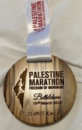 Medaille aus Olivenholz