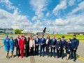 Großes Gruppenfoto mit Vertretern von Airlines und aus der Politik auf dem Brüsseler Vorfeld